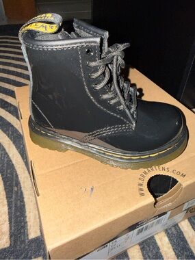 Dr. Martens Black Leather Combat Boot with Yellow Stitching